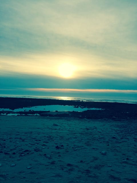 On the beach, sun loungers