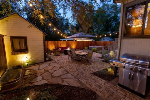Patio with hot tub, gas grill, fire pit and comfortable seating  