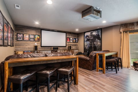 Downstairs features the 100” movie screen and both couches are sleeper sofas!