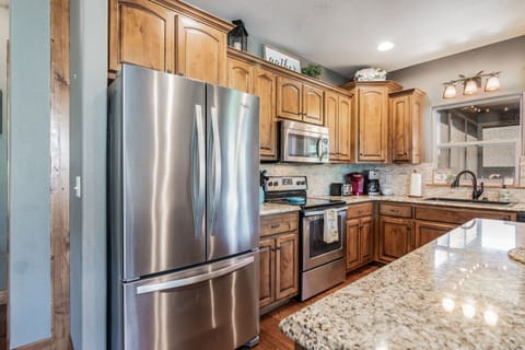 Stainless steal appliances & stocked cabinets ready for cooking your favorites!