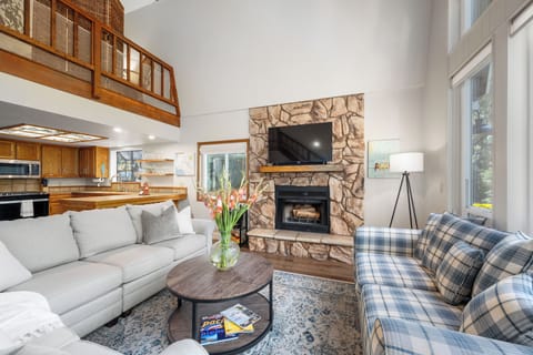 Wood burning fireplace with a 55 inch smart tv