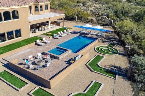 [Backyard] Resort Style heated pool, spa, mini-golf, fire pit and more