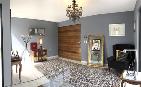 Entrance hall, 3 main bedrooms are at street level, social area downstairs