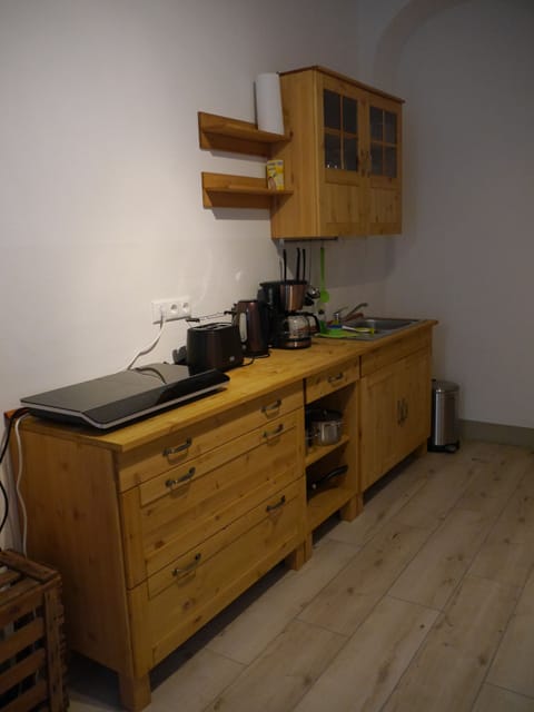 Fridge, microwave, stovetop, coffee/tea maker