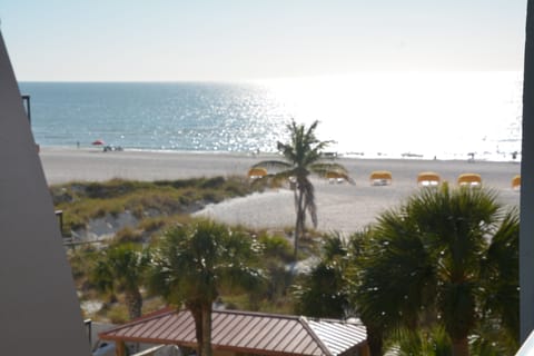 On the beach, sun loungers, beach towels