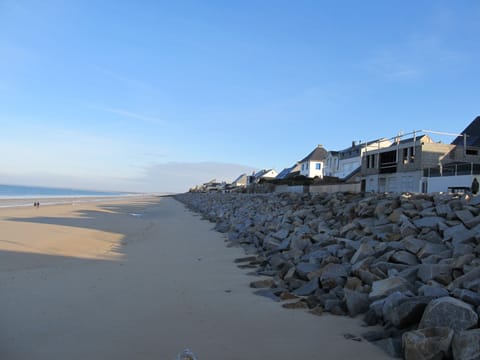 On the beach, sun loungers