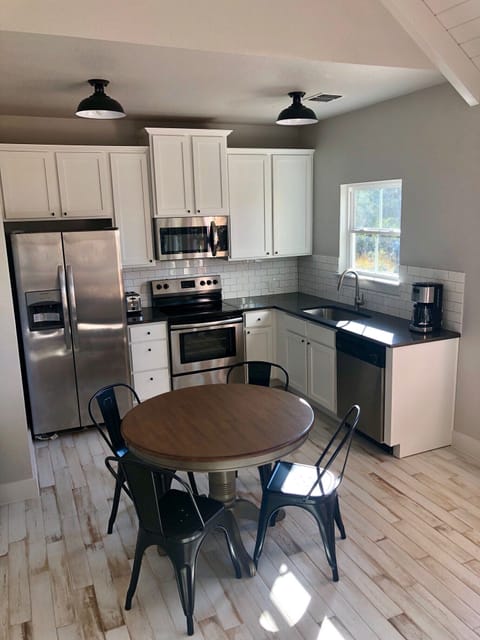 Beautiful Full Kitchen & a charming antique dining table.
