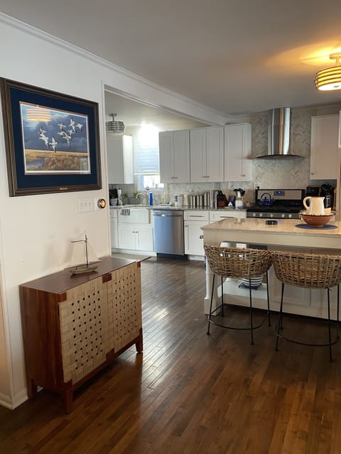 Kitchen island and game cabinet.