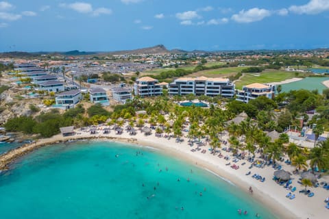 On the beach, sun loungers, beach towels