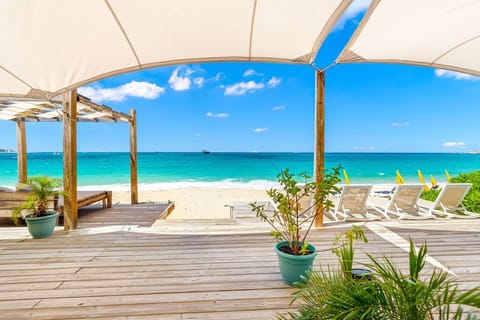 On the beach, sun loungers, beach towels