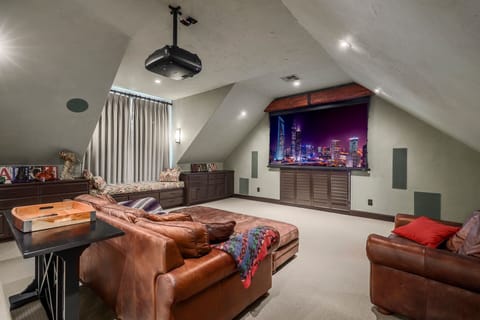 View movies or sports on the 9' screen with theater sound.