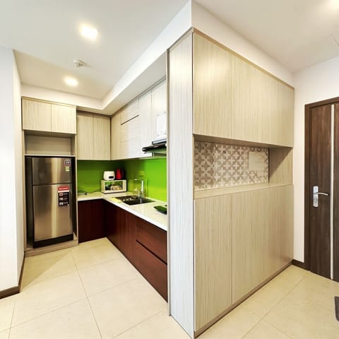 Fridge, electric kettle, spices, dining tables