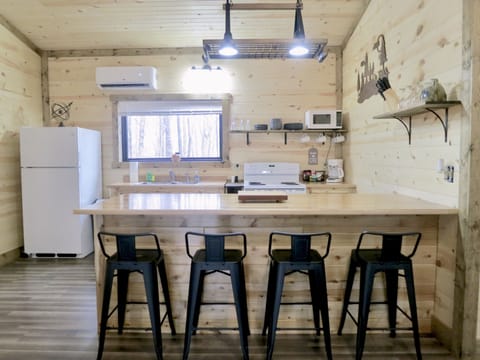Kitchen peninsula with bar seating.