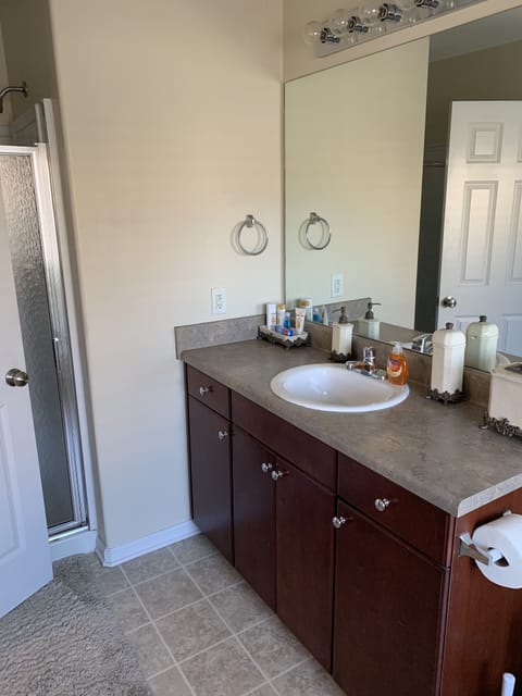 Combined shower/tub, hair dryer, towels, soap