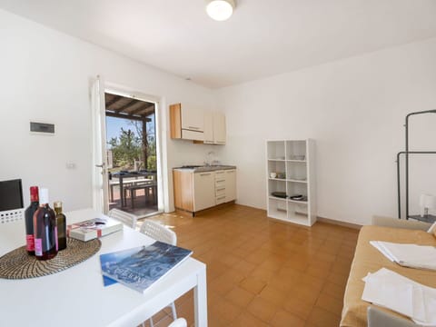 Property, Cabinetry, Table, Wood, Interior Design, Shelving, Living Room, Flooring, Real Estate, Hardwood