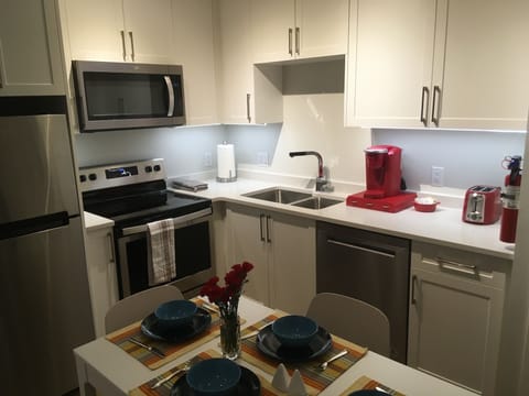 Fridge freezer, microwave, stove, dishwasher, coffee machine and toaster 