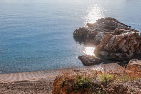 On the beach, sun loungers, beach towels