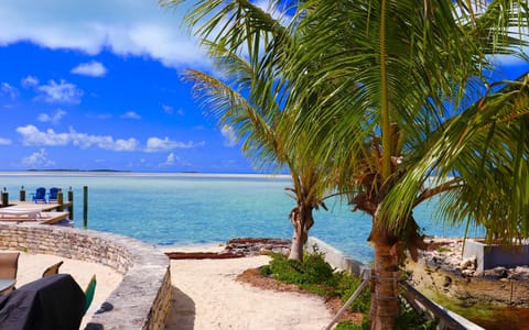 On the beach, sun loungers, beach towels