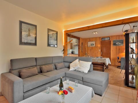 Couch, Furniture, Property, Picture Frame, Table, Living Room, Interior Design, Studio Couch, Floor, Wall