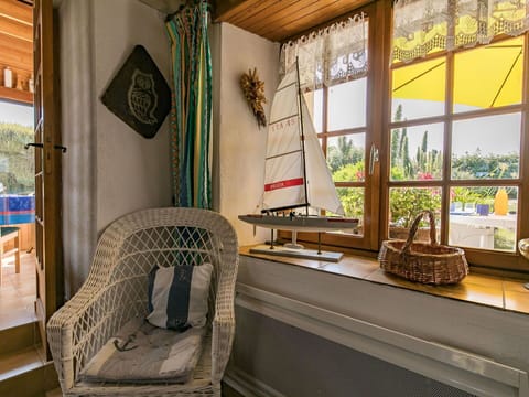 Property, Furniture, Plant, Window, Picture Frame, Interior Design, Wood, Building, Architecture, Living Room