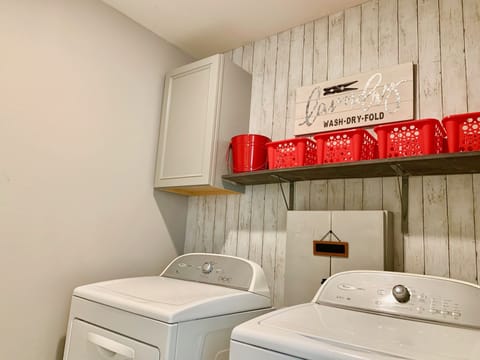 Laundry room with full-size washer and dryer