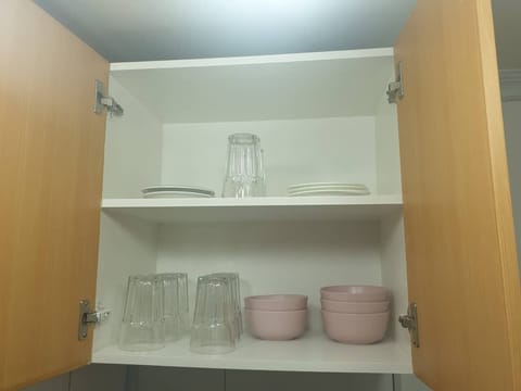 Fridge, microwave, cookware/dishes/utensils, spices