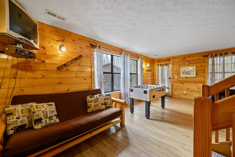 futon sleeper in the game room
