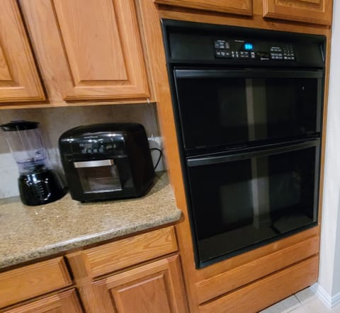 The built-in microwave, stove and oven