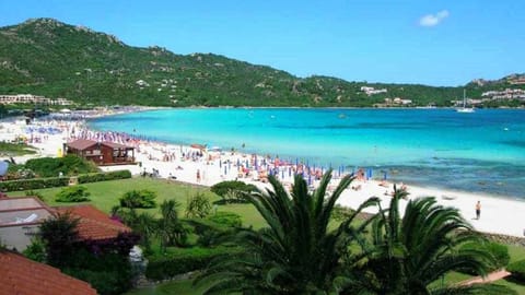 On the beach, sun loungers, beach towels