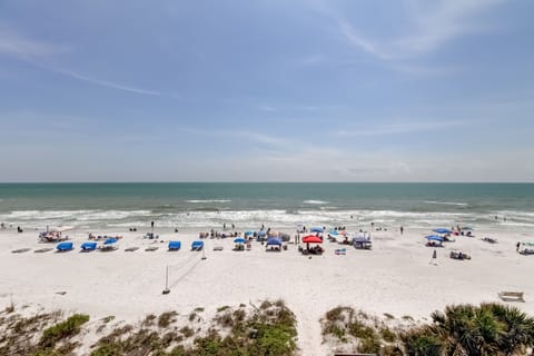 On the beach, sun loungers, beach towels