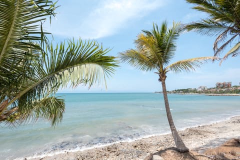 On the beach, sun loungers, beach towels