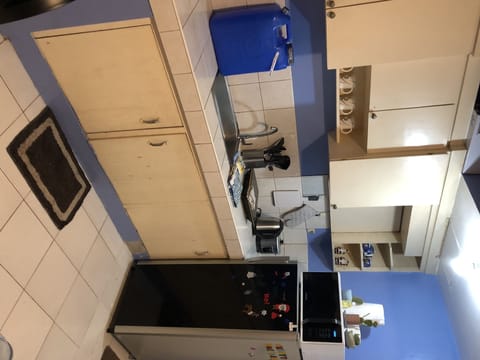 Fridge, microwave, electric kettle, cookware/dishes/utensils