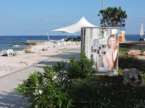 Beach nearby, sun loungers