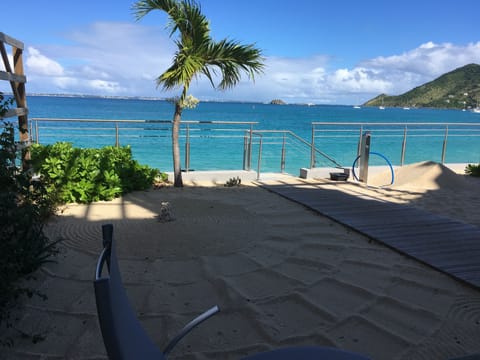 On the beach, sun loungers, beach towels