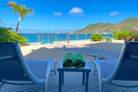 On the beach, sun loungers, beach towels