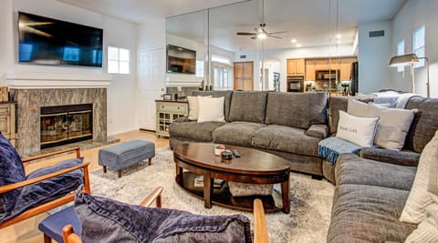 Enjoy a movie with the whole family on the massive wrap around couch and Smart TV
The fireplace is to not be utilized.