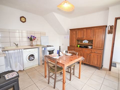 Furniture, Kitchen, Cabinetry, Interior Design, Kitchen Appliance, Countertop, Major Appliance, Wood, Flooring, Floor