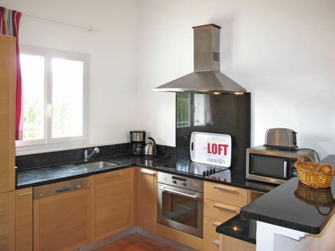 Property, Room, Countertop, Kitchen, Kitchen Stove, Furniture, Cabinetry, Building, Major Appliance, House