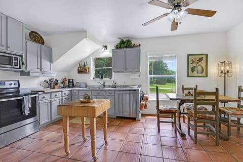 View showing the distance between the dining table and the kitchen.