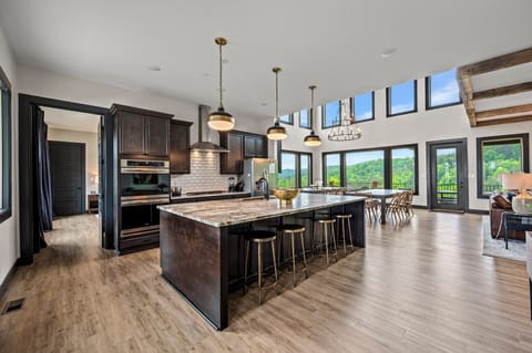 The kitchen is very well stocked with all the utensils, dinnerware, cookware, glassware, coffee makers, crockpots, etc that you might need for your big group of 20 guests!