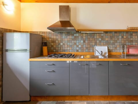 Cabinetry, Countertop, Building, Furniture, Kitchen Stove, Kitchen, Kitchen Appliance, Wood, Tap, Drawer