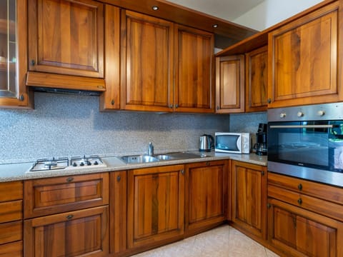 Brown, Cabinetry, Countertop, Kitchen Sink, Kitchen, Sink, Wood, Building, Kitchen Appliance, Interior Design