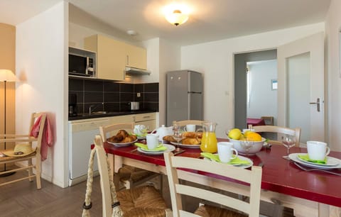 Prepare a meal in the equipped kitchen.