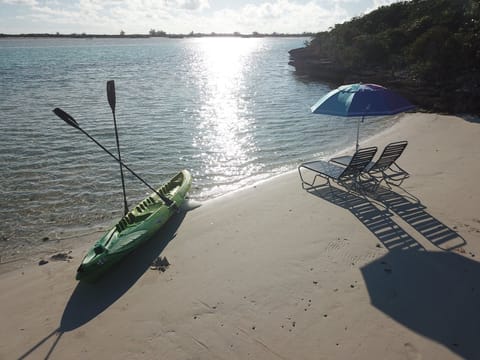 On the beach, sun loungers, beach towels