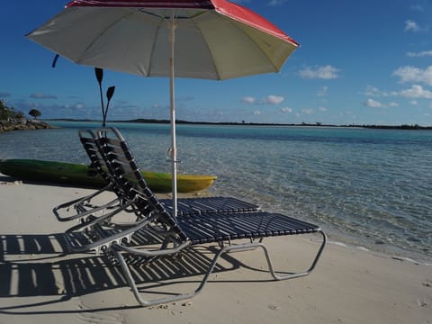 On the beach, sun loungers, beach towels