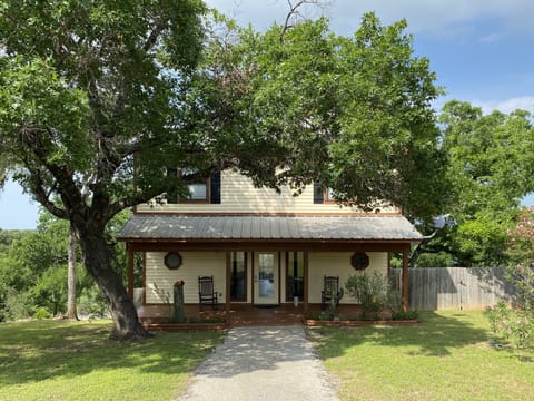 Private home with relaxing rocking chairs on the covered front porch