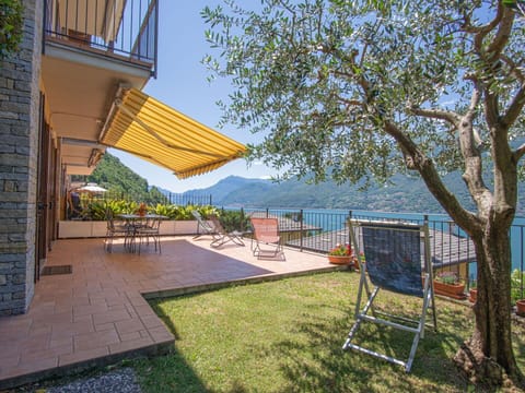 Water, Plant, Furniture, Property, Sky, Building, Shade, Tree, Outdoor Furniture, Chair