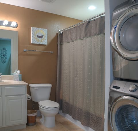 Combined shower/tub, hair dryer, towels, soap