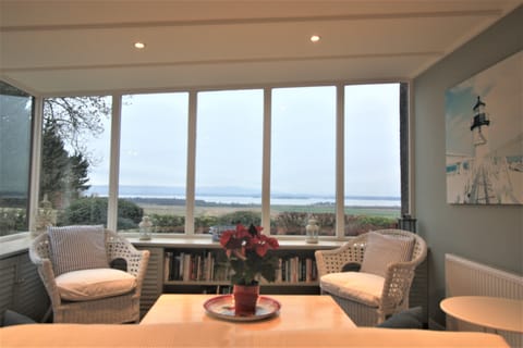 Enjoy the Loch views from the sunroom