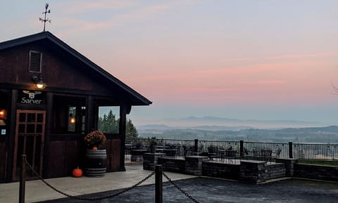 Cool fall morning with view of rustic tasting room.